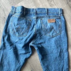 Wrangler Blue Relaxed Fit Jeans with Gold Stitching